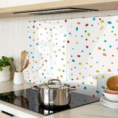 Tagliere in vetro temperato con punti colorati su sfondo bianco