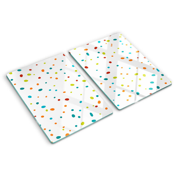 Tagliere in vetro temperato con punti colorati su sfondo bianco