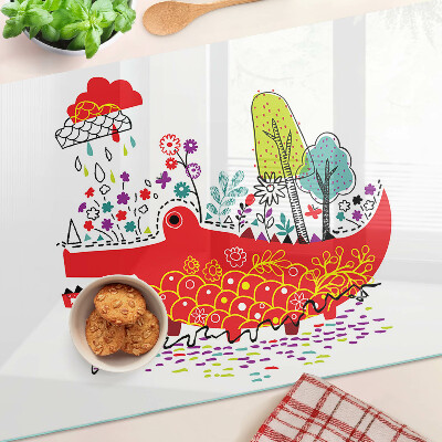 Tagliere in vetro con decoro a coccodrillo in una scena colorata