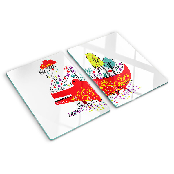 Tagliere in vetro con decoro a coccodrillo in una scena colorata