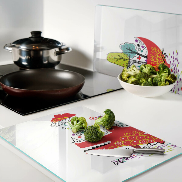 Tagliere in vetro con decoro a coccodrillo in una scena colorata