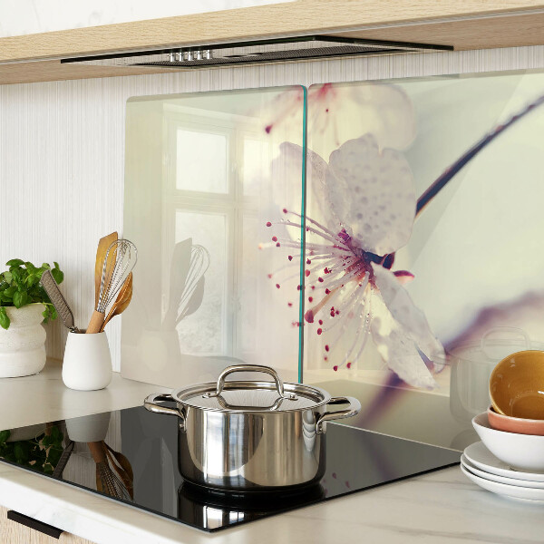 Tagliere in vetro temperato con motivo floreale su sfondo geometrico