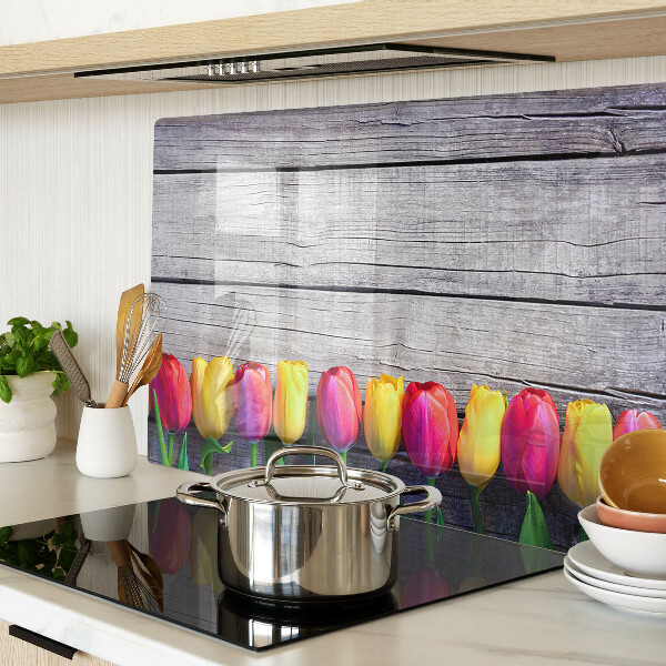 Tagliere in vetro temperato con stampa di tulipani su sfondo di legno