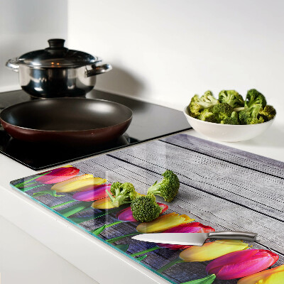 Tagliere in vetro temperato con stampa di tulipani su sfondo di legno