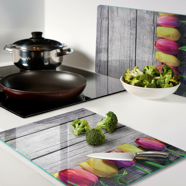 Tagliere in vetro temperato con stampa di tulipani su sfondo di legno