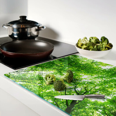 Tagliere in vetro con motivo foresta e fogliame verde