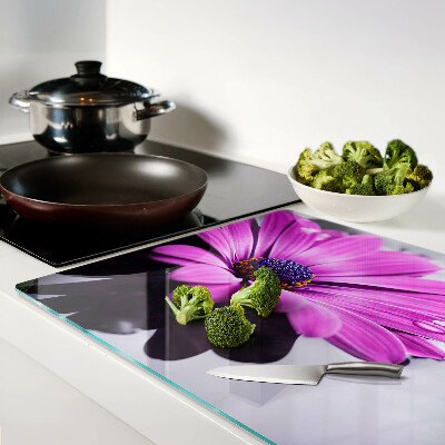 Tagliere in vetro temperato con motivo di fiore viola e gocce d'acqua