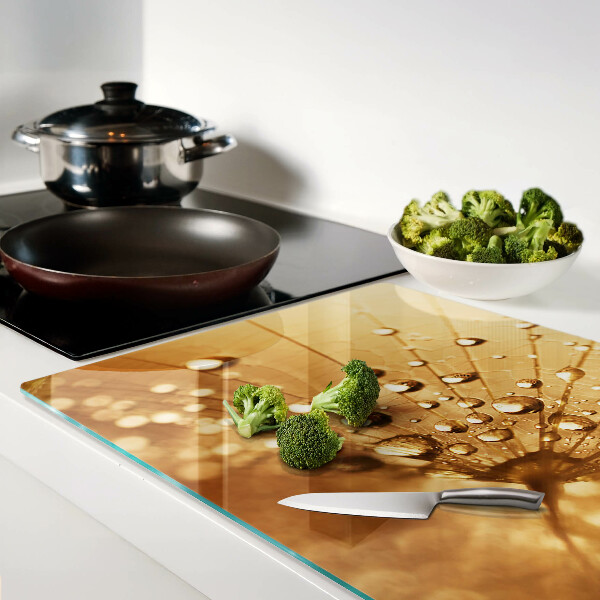 Tagliere in vetro temperato con motivo di gocce d'acqua sul soffione (dente di leone)