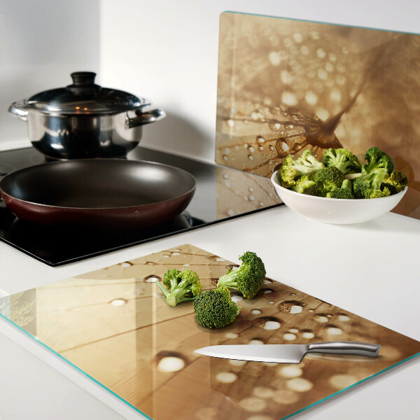 Tagliere in vetro temperato con motivo di gocce d'acqua sul soffione (dente di leone)