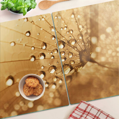 Tagliere in vetro temperato con motivo di gocce d'acqua sul soffione (dente di leone)