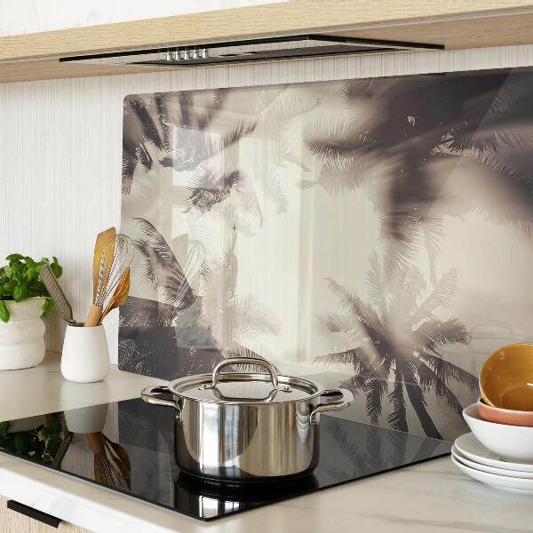 Tagliere in vetro temperato con motivo di palme su sfondo monocromatico