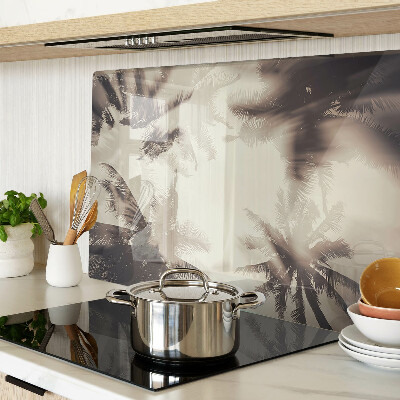 Tagliere in vetro temperato con motivo di palme su sfondo monocromatico