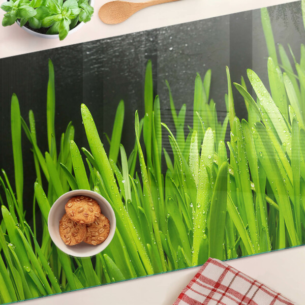 Tagliere in vetro temperato con motivo di erba verde con gocce d'acqua