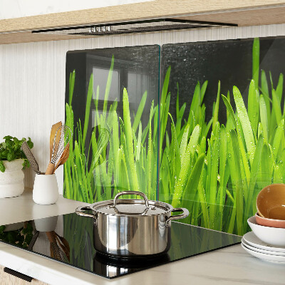 Tagliere in vetro temperato con motivo di erba verde con gocce d'acqua