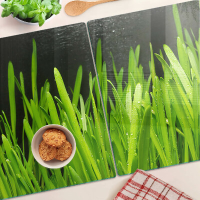 Tagliere in vetro temperato con motivo di erba verde con gocce d'acqua