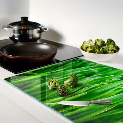 Tagliere in vetro temperato con motivo di erba e gocce d'acqua