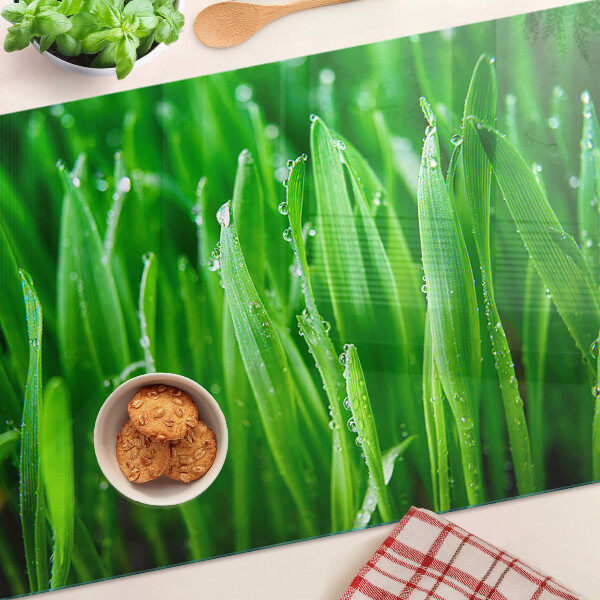 Tagliere in vetro temperato con motivo di erba e gocce d'acqua