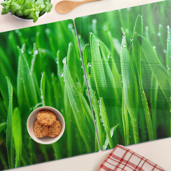 Tagliere in vetro temperato con motivo di erba e gocce d'acqua
