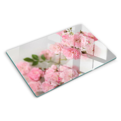 Tagliere in vetro con decorazione di fiori rosa in vaso