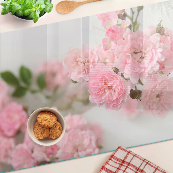 Tagliere in vetro con decorazione di fiori rosa in vaso