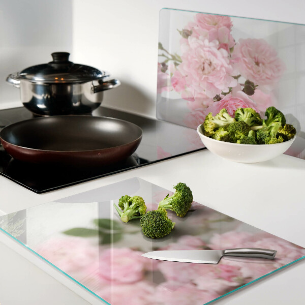 Tagliere in vetro con decorazione di fiori rosa in vaso