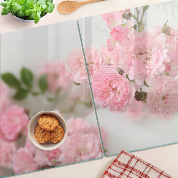 Tagliere in vetro con decorazione di fiori rosa in vaso