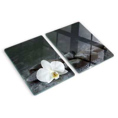 Tagliere in vetro temperato con motivo a fiore di orchidea su pietre