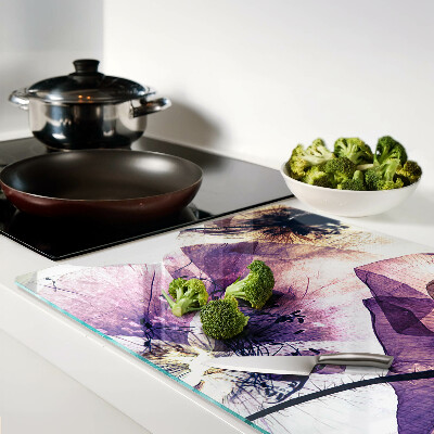 Tagliere in vetro temperato con decorazione di fiori nei toni del viola e del giallo