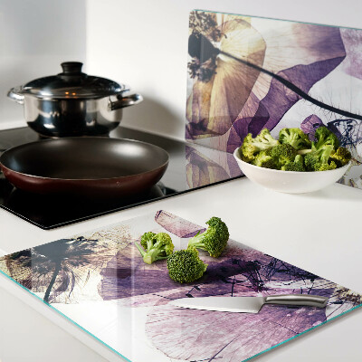 Tagliere in vetro temperato con decorazione di fiori nei toni del viola e del giallo