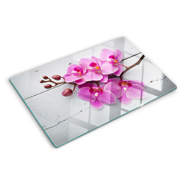 Tagliere in vetro temperato con motivo di orchidee su sfondo bianco