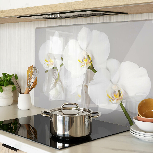 Tagliere in vetro temperato con motivo di orchidee su sfondo specchiante