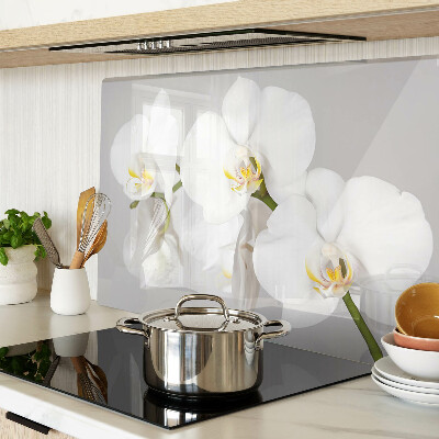 Tagliere in vetro temperato con motivo di orchidee su sfondo specchiante