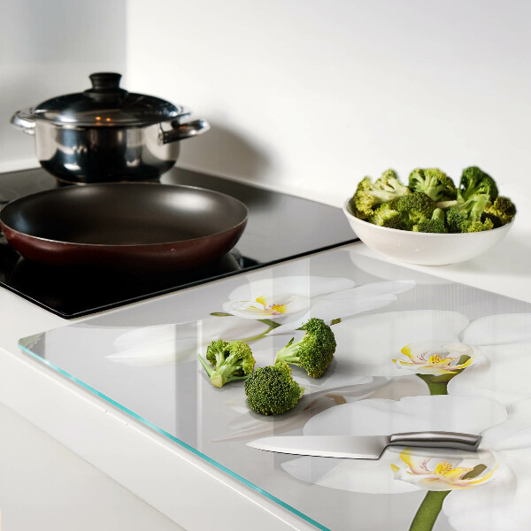 Tagliere in vetro temperato con motivo di orchidee su sfondo specchiante