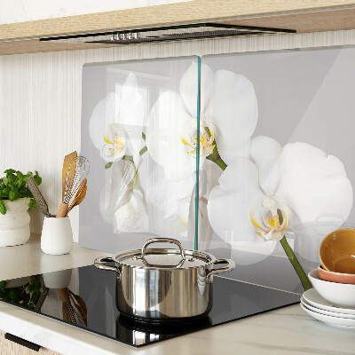 Tagliere in vetro temperato con motivo di orchidee su sfondo specchiante