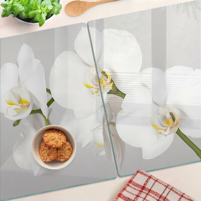 Tagliere in vetro temperato con motivo di orchidee su sfondo specchiante