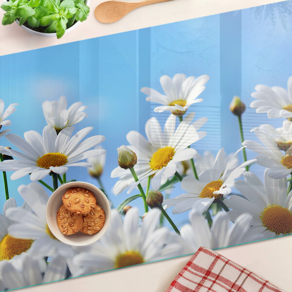 Tagliere in vetro con motivo di fiori di margherita su sfondo blu