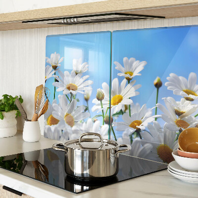 Tagliere in vetro con motivo di fiori di margherita su sfondo blu