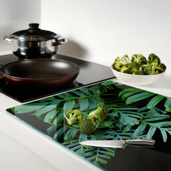 Tagliere in vetro temperato con motivo di foglie tropicali