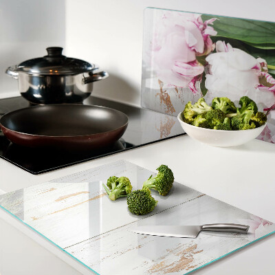 Tagliere in vetro con stampa di fiori di peonia su sfondo effetto legno