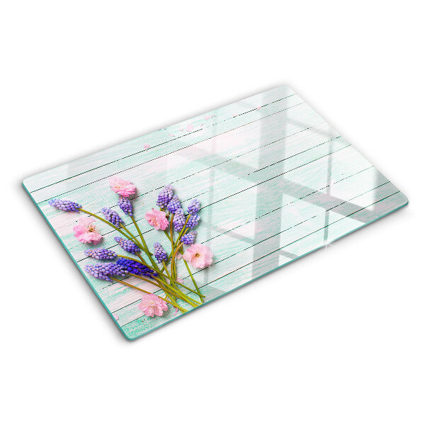 Tagliere in vetro temperato con stampa di fiori su sfondo di legno