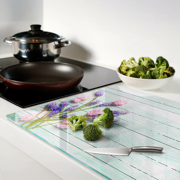 Tagliere in vetro temperato con stampa di fiori su sfondo di legno