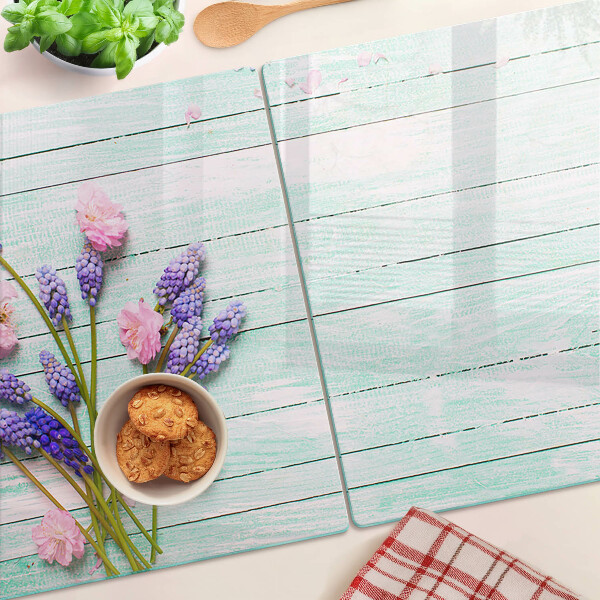 Tagliere in vetro temperato con stampa di fiori su sfondo di legno