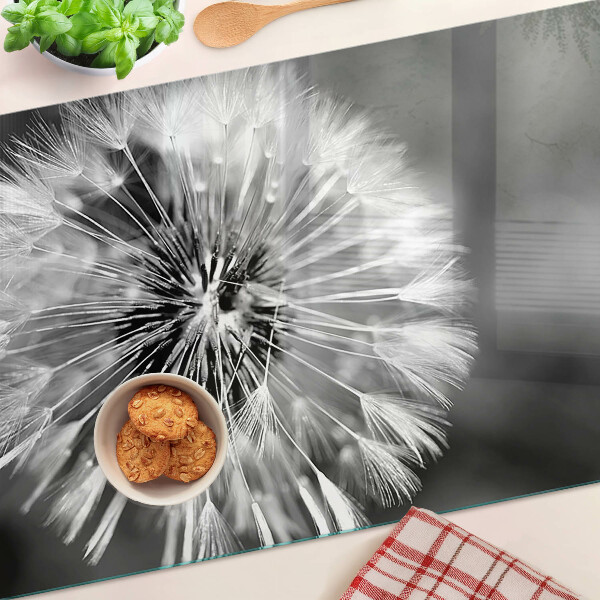 Tagliere in vetro temperato con motivo di denti di leone in bianco e nero