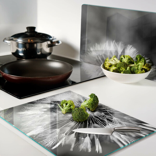 Tagliere in vetro temperato con motivo di denti di leone in bianco e nero