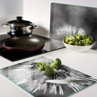 Tagliere in vetro temperato con motivo di denti di leone in bianco e nero