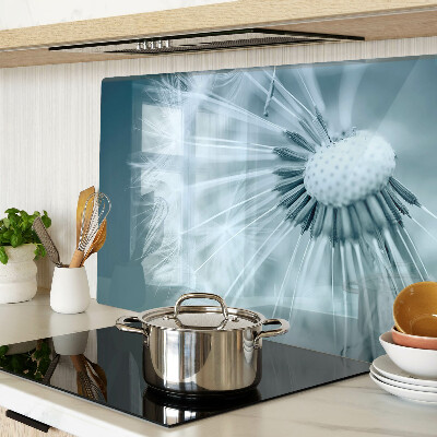 Tagliere in vetro temperato con motivo di denti di leone su sfondo cielo