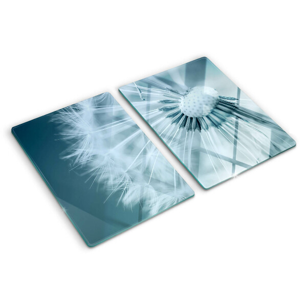 Tagliere in vetro temperato con motivo di denti di leone su sfondo cielo