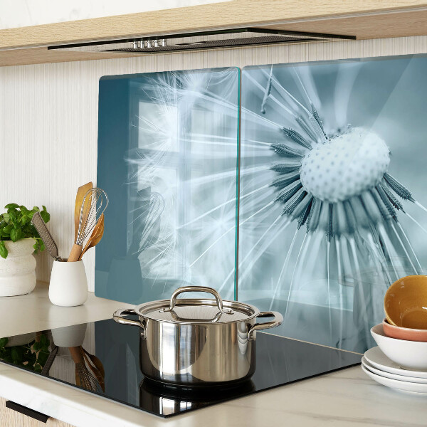 Tagliere in vetro temperato con motivo di denti di leone su sfondo cielo