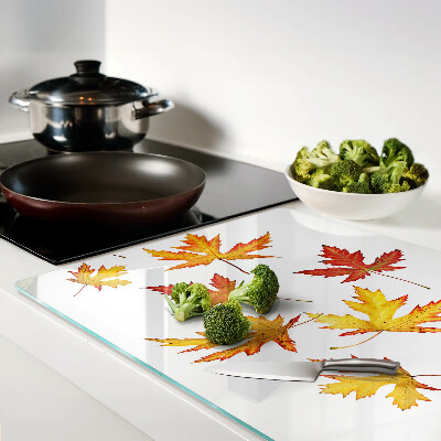 Tagliere in vetro temperato con motivo di foglie di acero nei colori autunnali