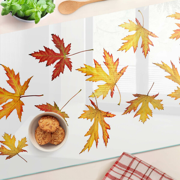 Tagliere in vetro temperato con motivo di foglie di acero nei colori autunnali